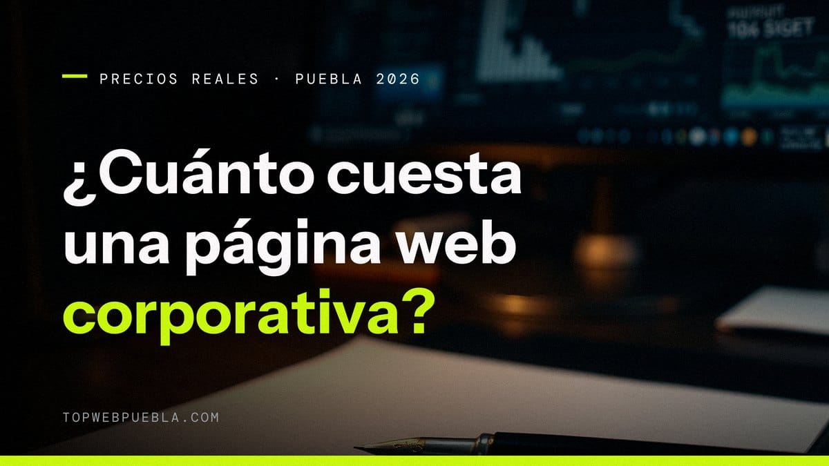 Portada sobre el costo de una página web corporativa en Puebla en 2026: pluma y hojas sobre un escritorio con un monitor desenfocado al fondo